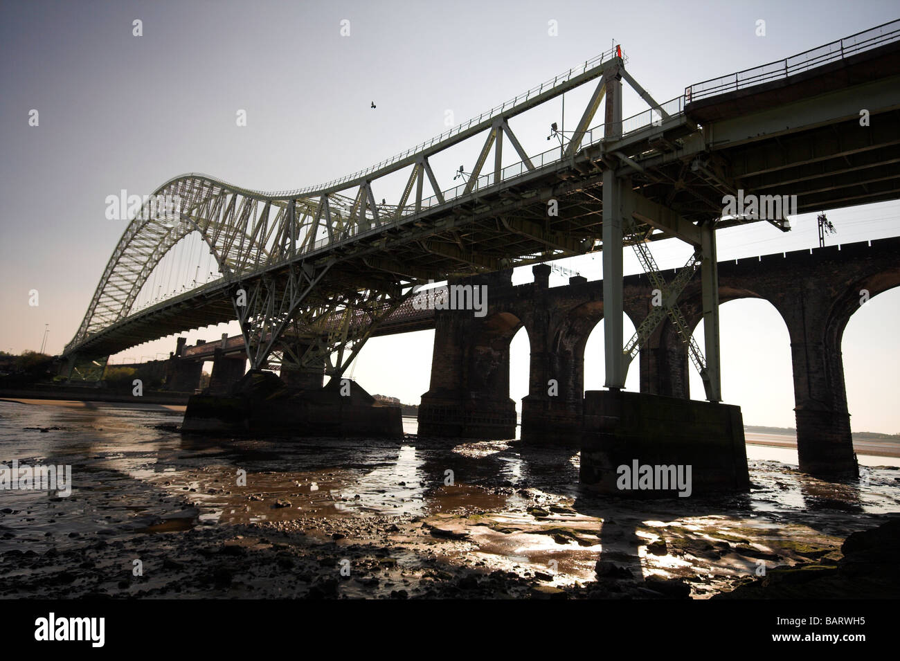 The Silver Jubilee Bridge over the River Mersey and Manchester Ship Canal at Runcorn Gap, Cheshire, UK Stock Photo