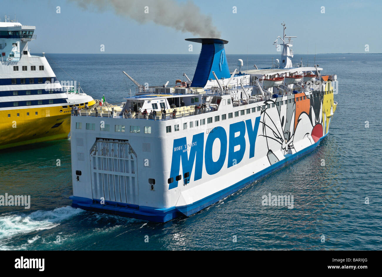 The Moby Lines car ferry Moby Vincent leaving Bastia in Corsica. Corsica Ferries' Mega Smeralda is behind. Stock Photo