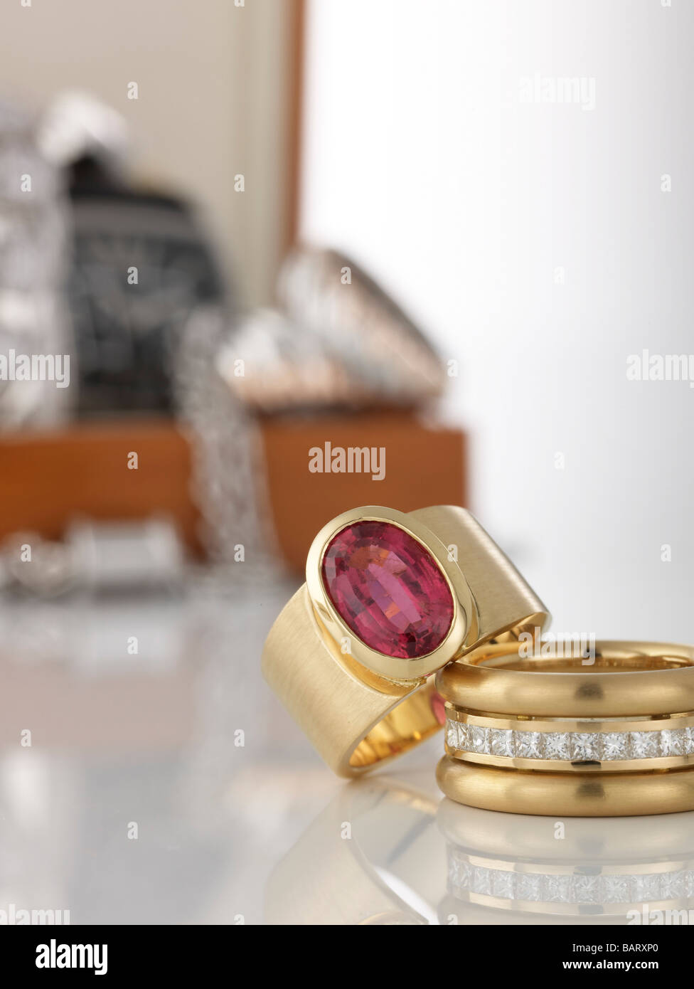Two rings in foreground, in the background jewel box Stock Photo