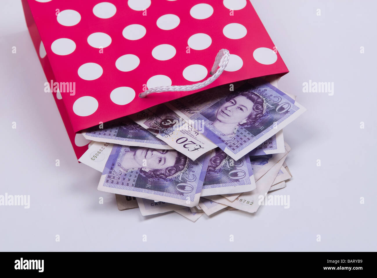 British money inside a shopping bag Stock Photo