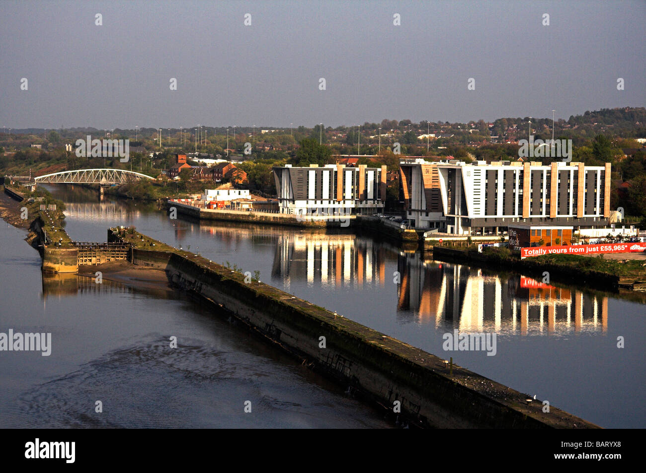 Modern apartments on the Manchester Ship Canal, taken from the Runcorn Bridge, Widnes, Cheshire, UK Stock Photo