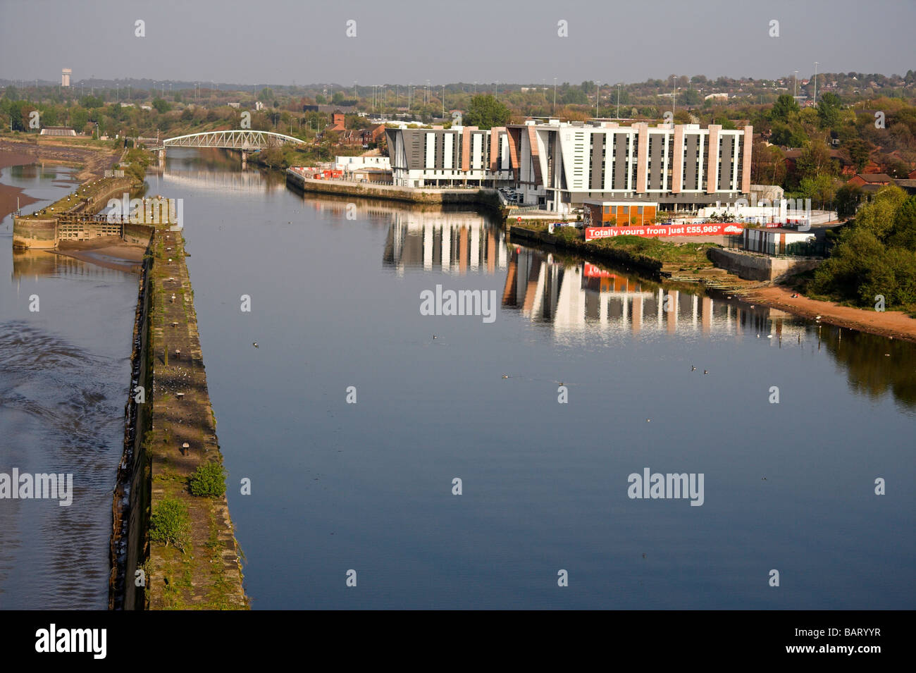 Modern apartments on the Manchester Ship Canal, taken from the Runcorn Bridge, Widnes, Cheshire, UK Stock Photo