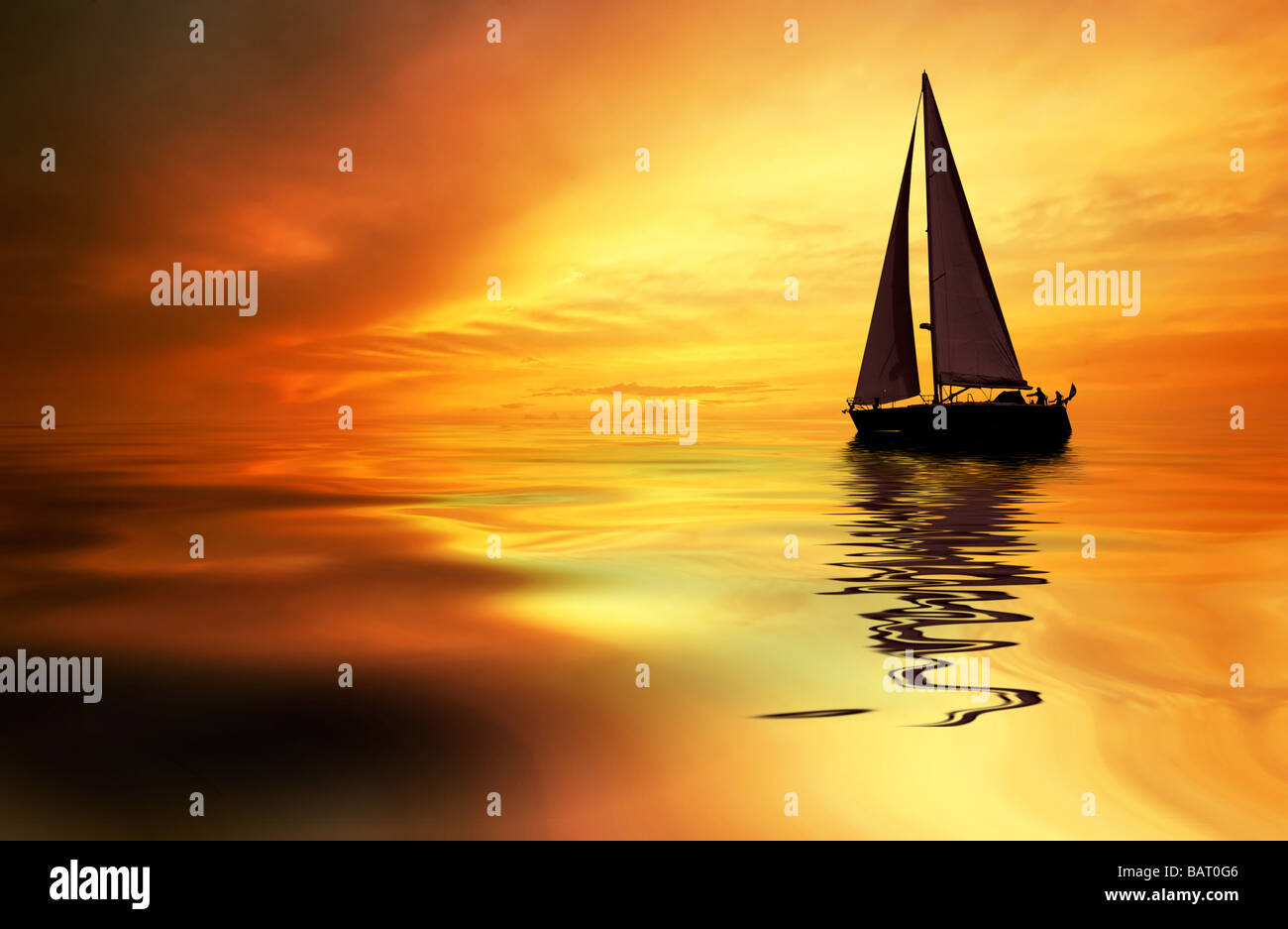 Sailboat against a beautiful sunset Stock Photo