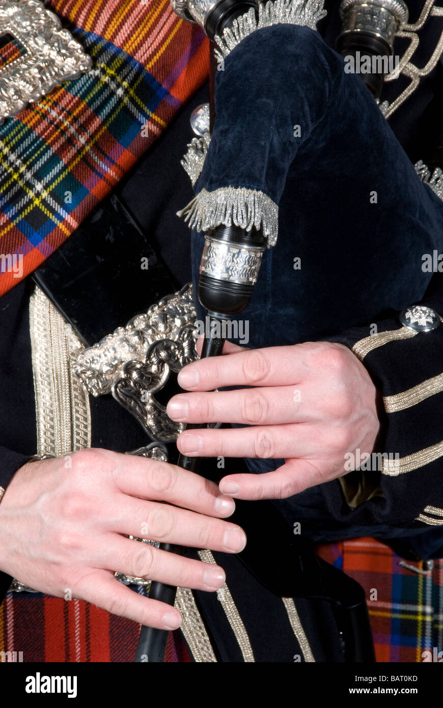 Bagpiper in Full Scottish Highland Dress Stock Photo