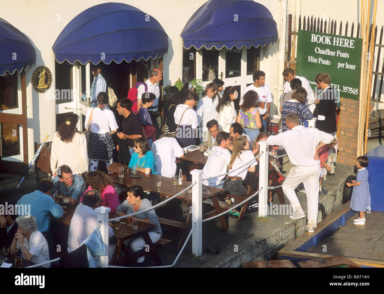 Anchor Inn Riverside Pub Cambridge Punts for hire drinking drinks drinkers terrace tables beer East Anglia England UK students Stock Photo