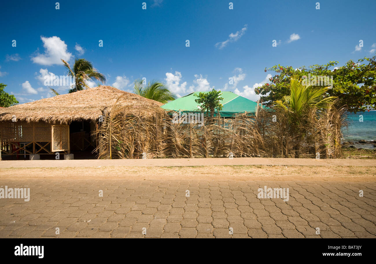 typical native architecture thatched roof building by the sea big corn island nicaragua central america Stock Photo
