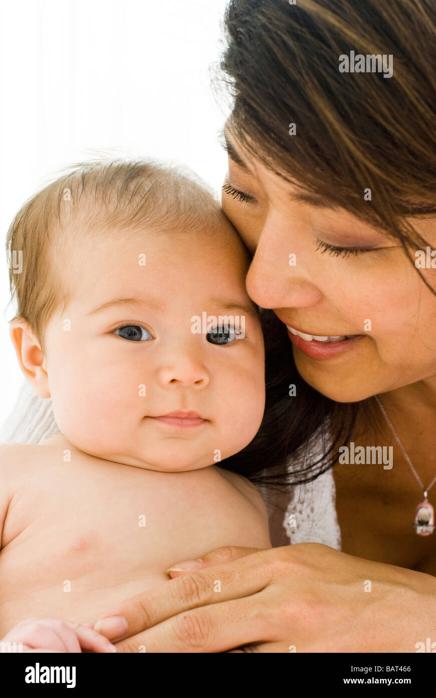 portrait of mother holding baby Stock Photo Alamy