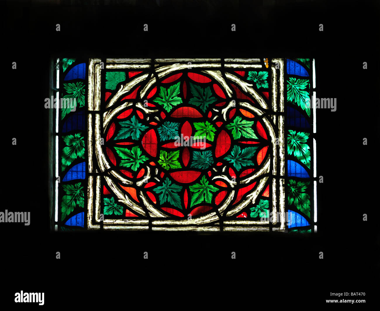 Parish Church of St Peter Walton on the Hill Surrey England Stained Glass Window and Vine and Leaves Stock Photo