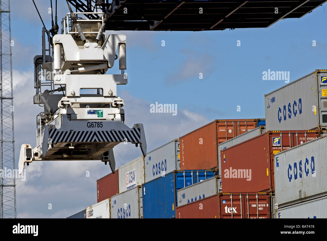 Gantry crane operating at the southern rail terminal, Port of Felixstowe, Suffolk, UK. Stock Photo