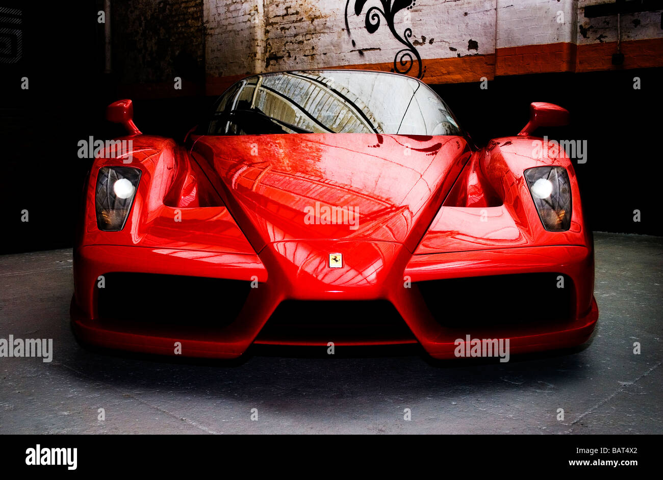 Front end view of a red Ferrari Enzo bonnet or hood indoors in garage Stock Photo