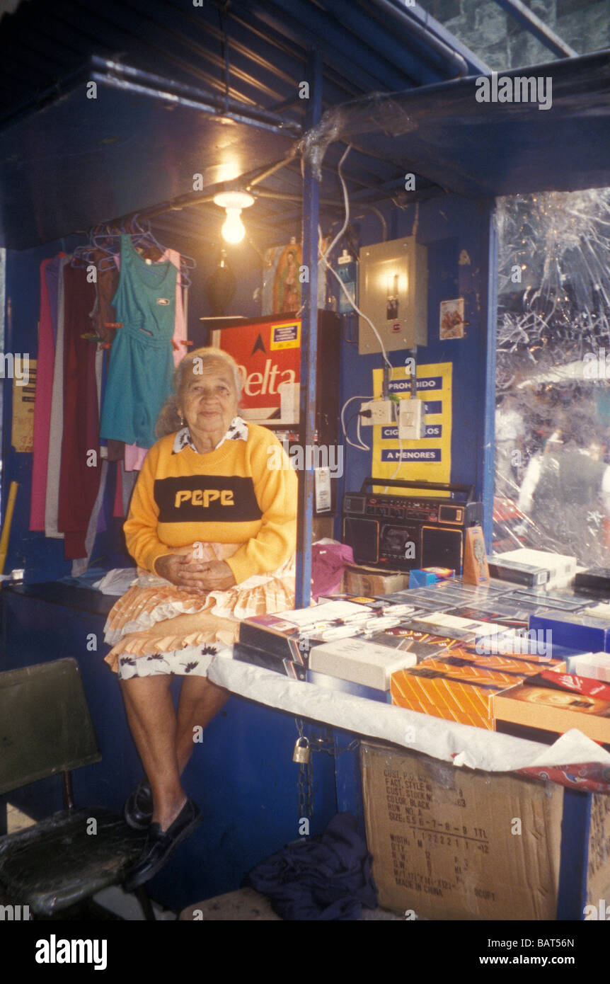 Elderly Costa Rican woman sidewalk vendor in San Jose, Costa Rica Stock Photo