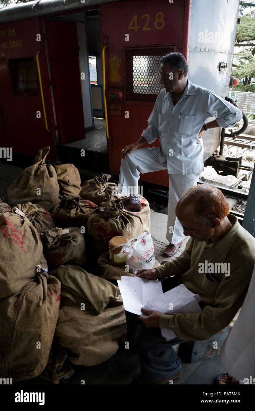 Rail Post Office Staff Examine Unloaded Mail Bags From The Stock Photo Alamy