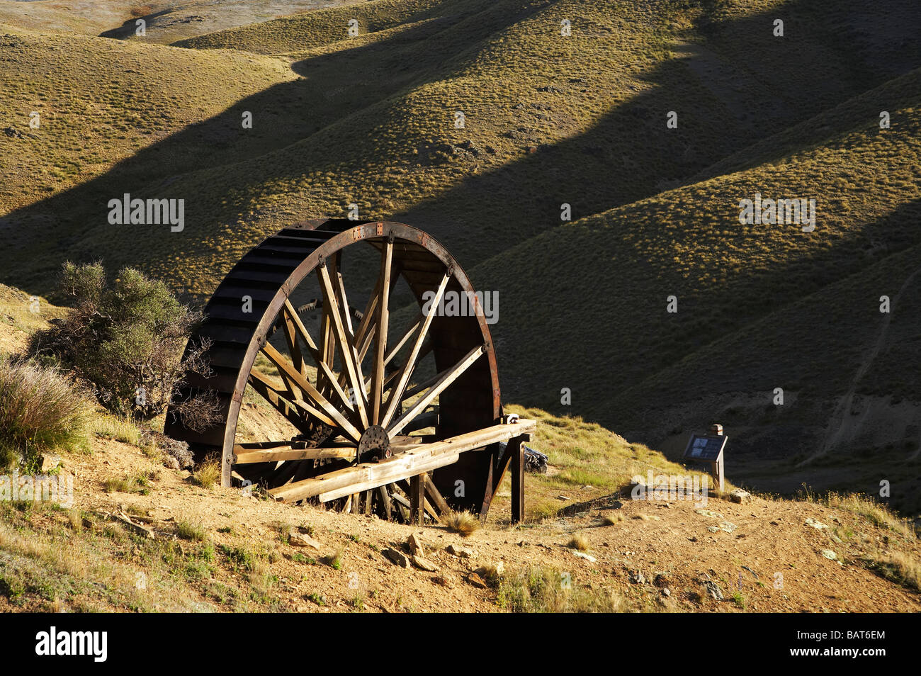 Historic Waterwheel Young Australian Gold Mine Carrick Range near Bannockburn Central Otago South Island New Zealand Stock Photo