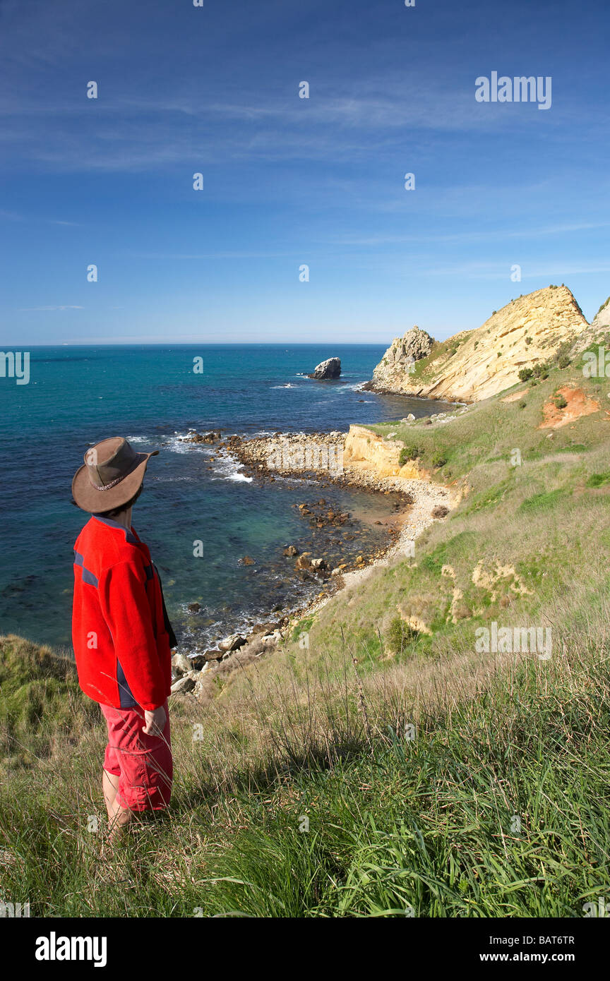 Woman on Huriawa Peninsula Historic Maori Pa Site Karitane near Dunedin