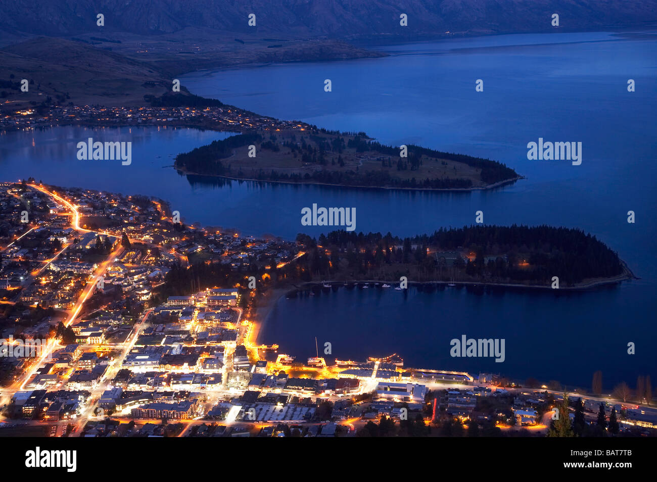 Dusk over Queenstown and Lake Wakatipu South Island New Zealand Stock ...