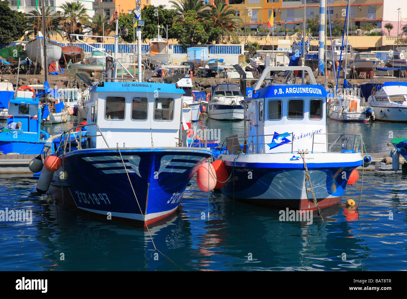 Fishing boats in the port of Arguineguin Gran Canaria Spain Europe Stock Photo