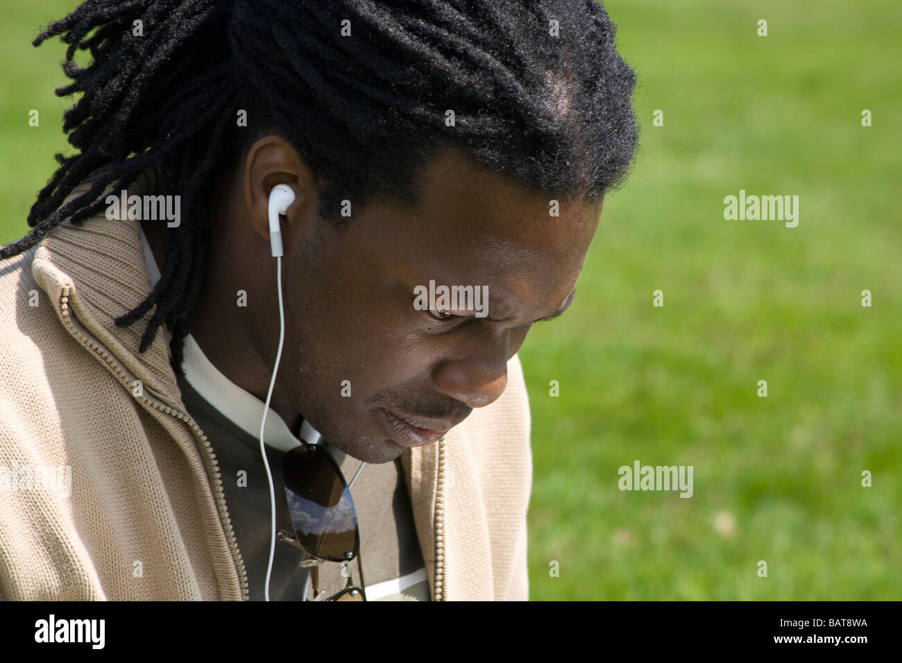 A black male listening to music. Stock Photo