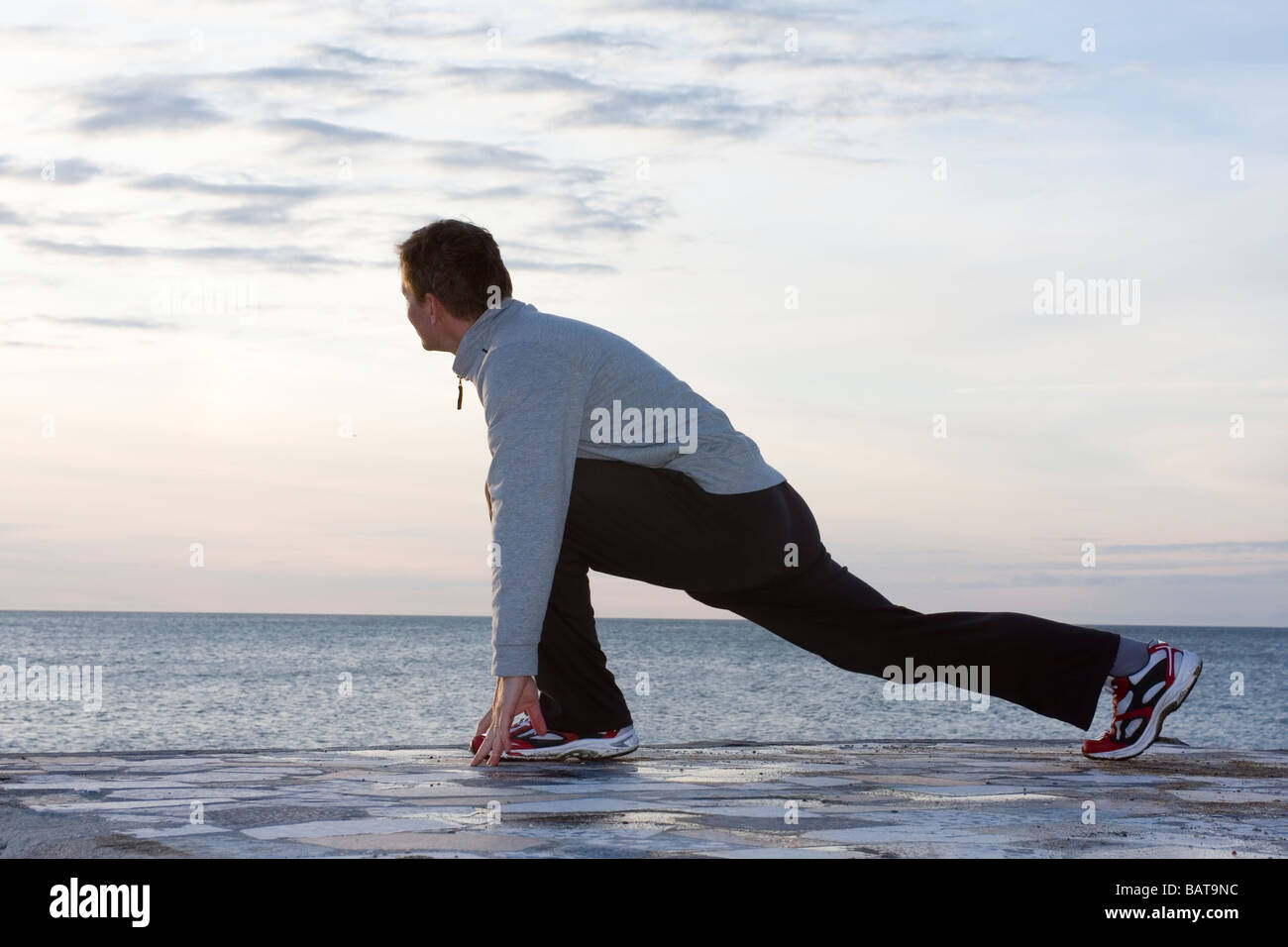 Stretching exercises man hi-res stock photography and images - Alamy