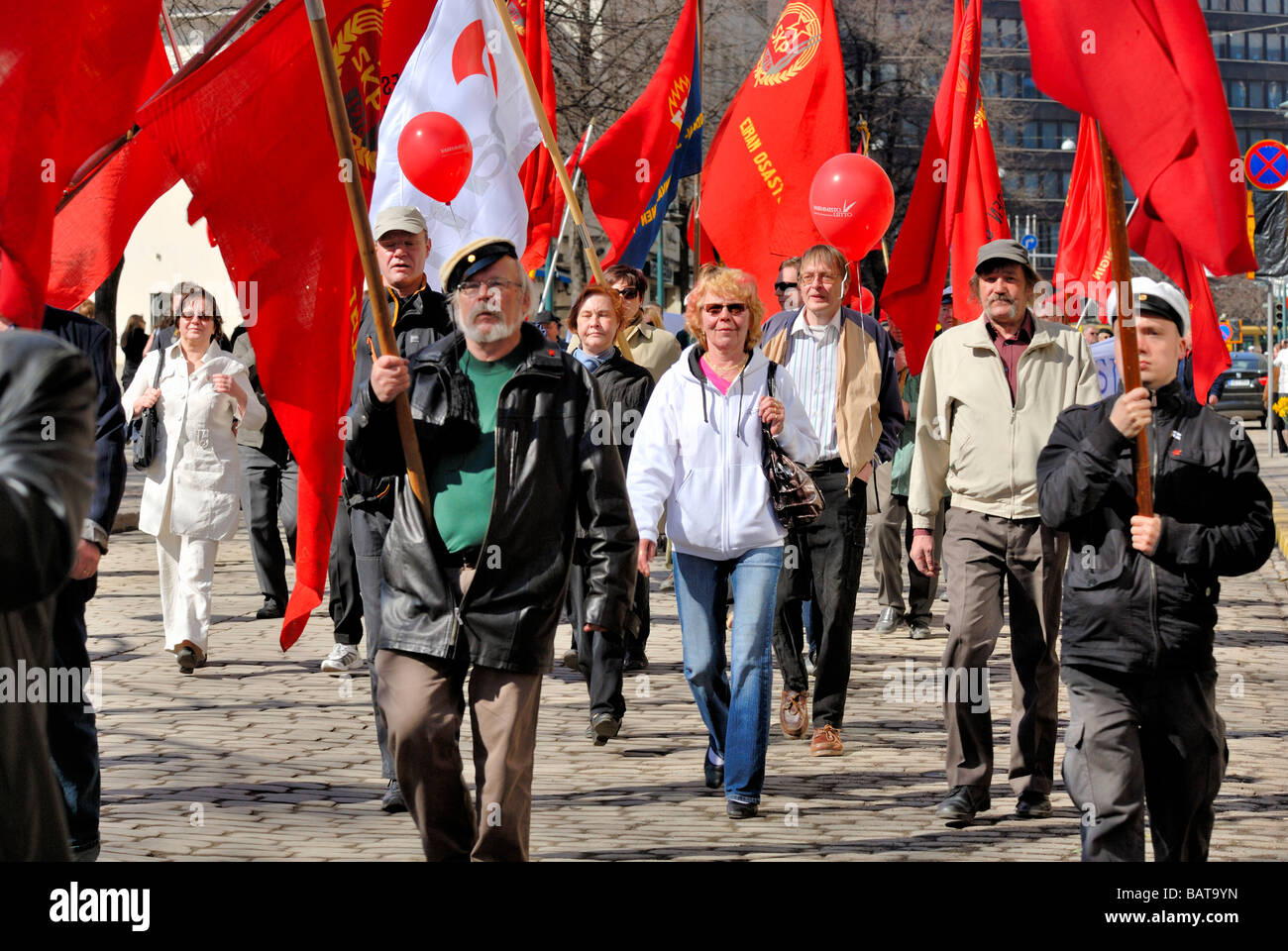 The Finnish Communist Party, SKP, May Day parade with the red flags at the Esplanade, Helsinki, Finland, Scandinavia, Europe. Stock Photo