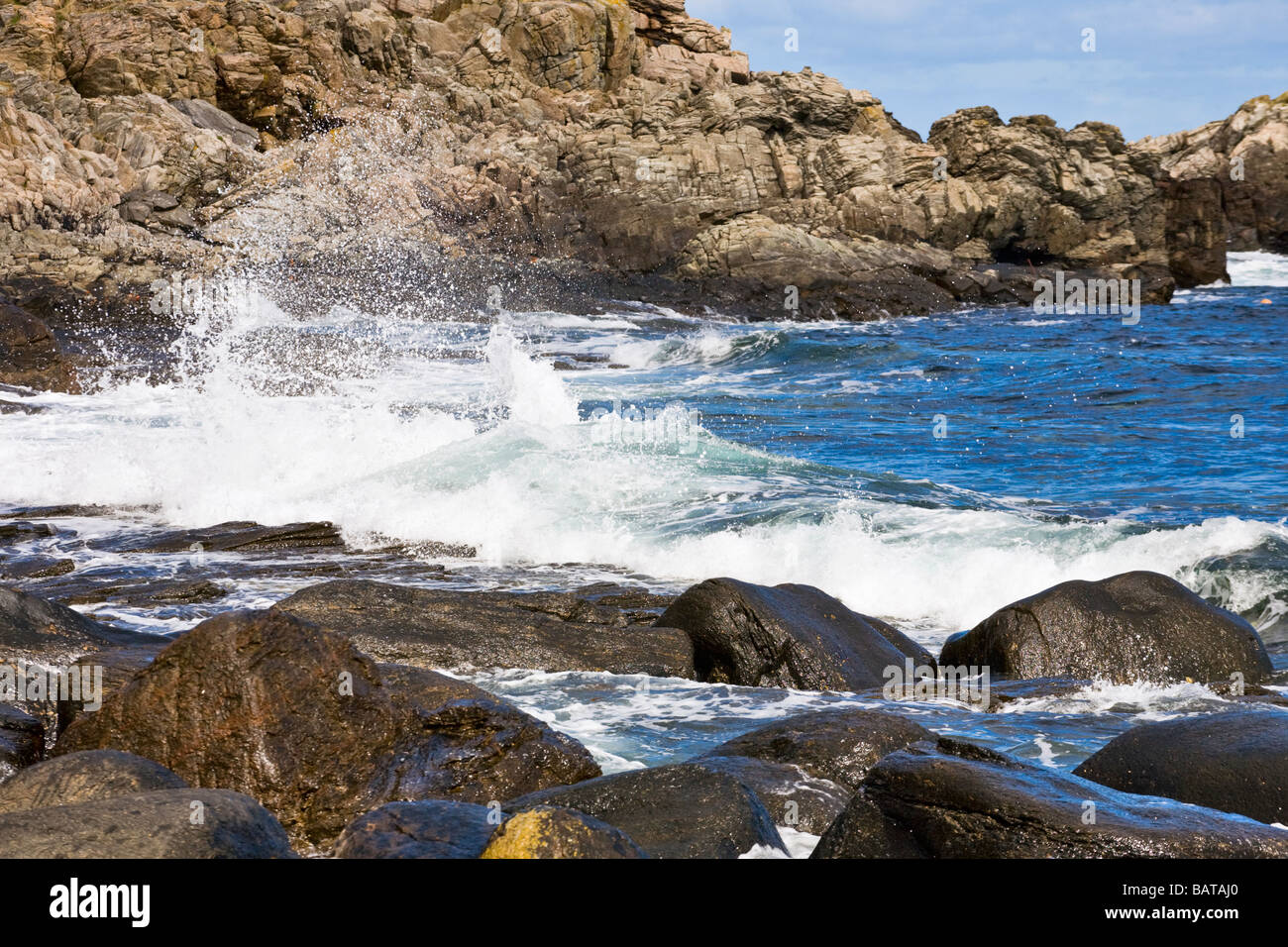 Waves at the rocky coast Stock Photo - Alamy