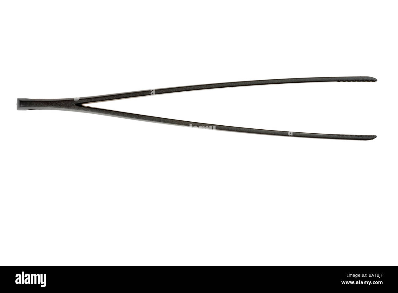 Black plastic tongs Stock Photo - Alamy