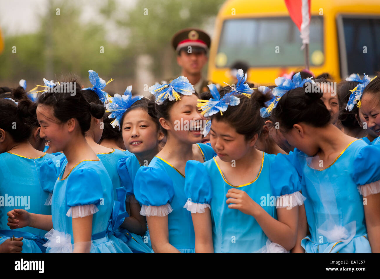 School children at the city sports stadium to rehearse for a parade in front of Party Leaders, Changchun Jilin Province China. Stock Photo