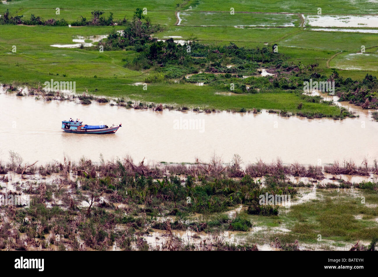 Junk boat travels up the Ayeyarwady Delta after Cyclone Nargis struck Myanmar between the 2nd and 3rd of May 2008 and destroyed Stock Photo