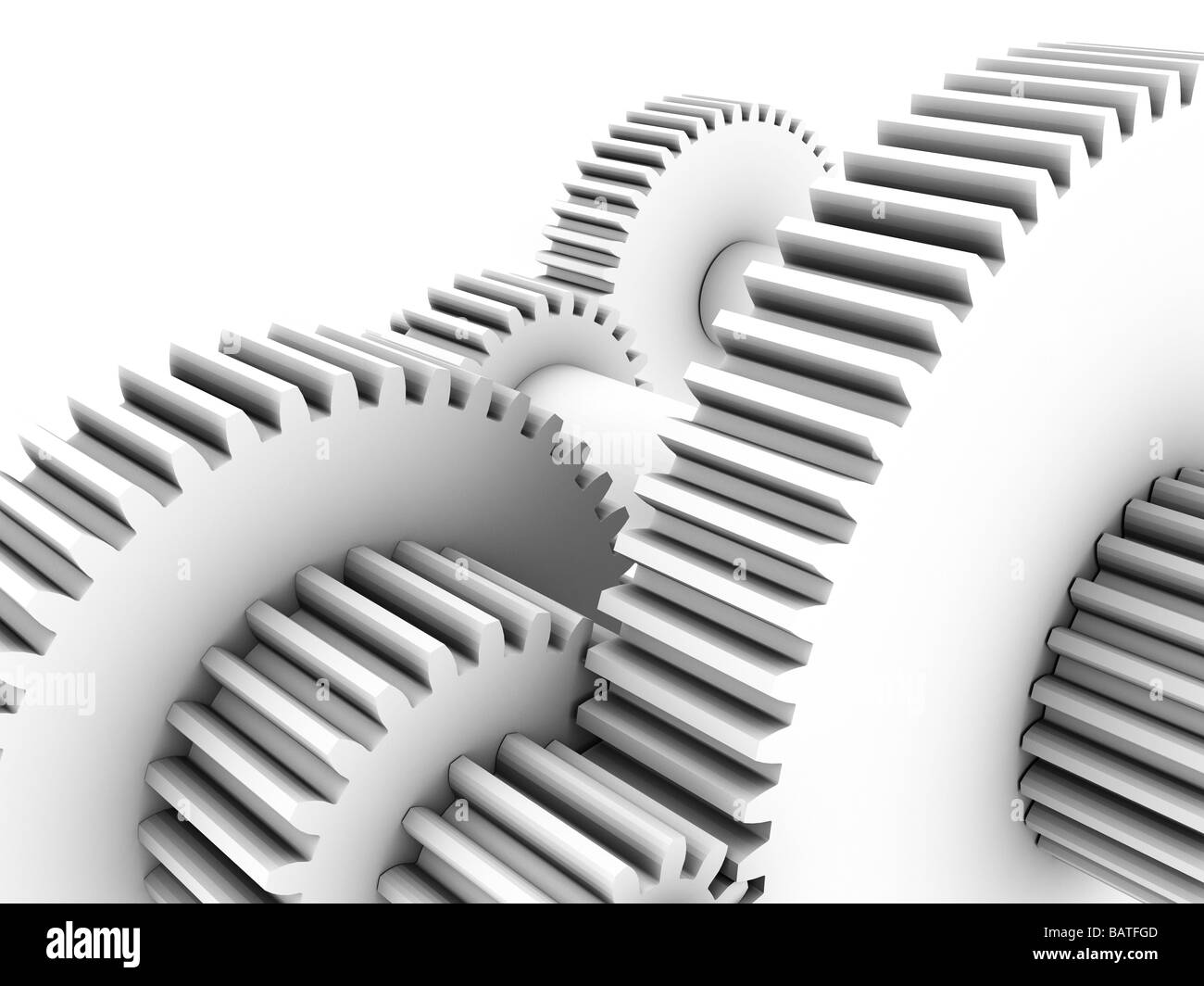 Gear wheels, computer artwork. Gear wheels, orcogs, transmit rotational force within machines. Stock Photo