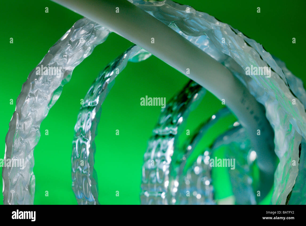 Insulation material wrapped round a plastic waterpipe Stock Photo Alamy