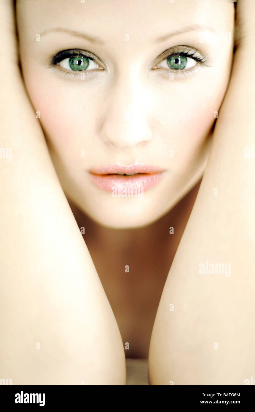 Upset woman holding face in hands hi-res stock photography and images ...