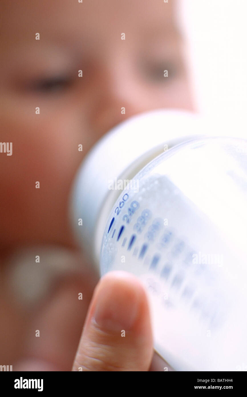 Bottlefeeding baby. Bottle being used to feed milk to a 2monthold baby boy Stock Photo Alamy