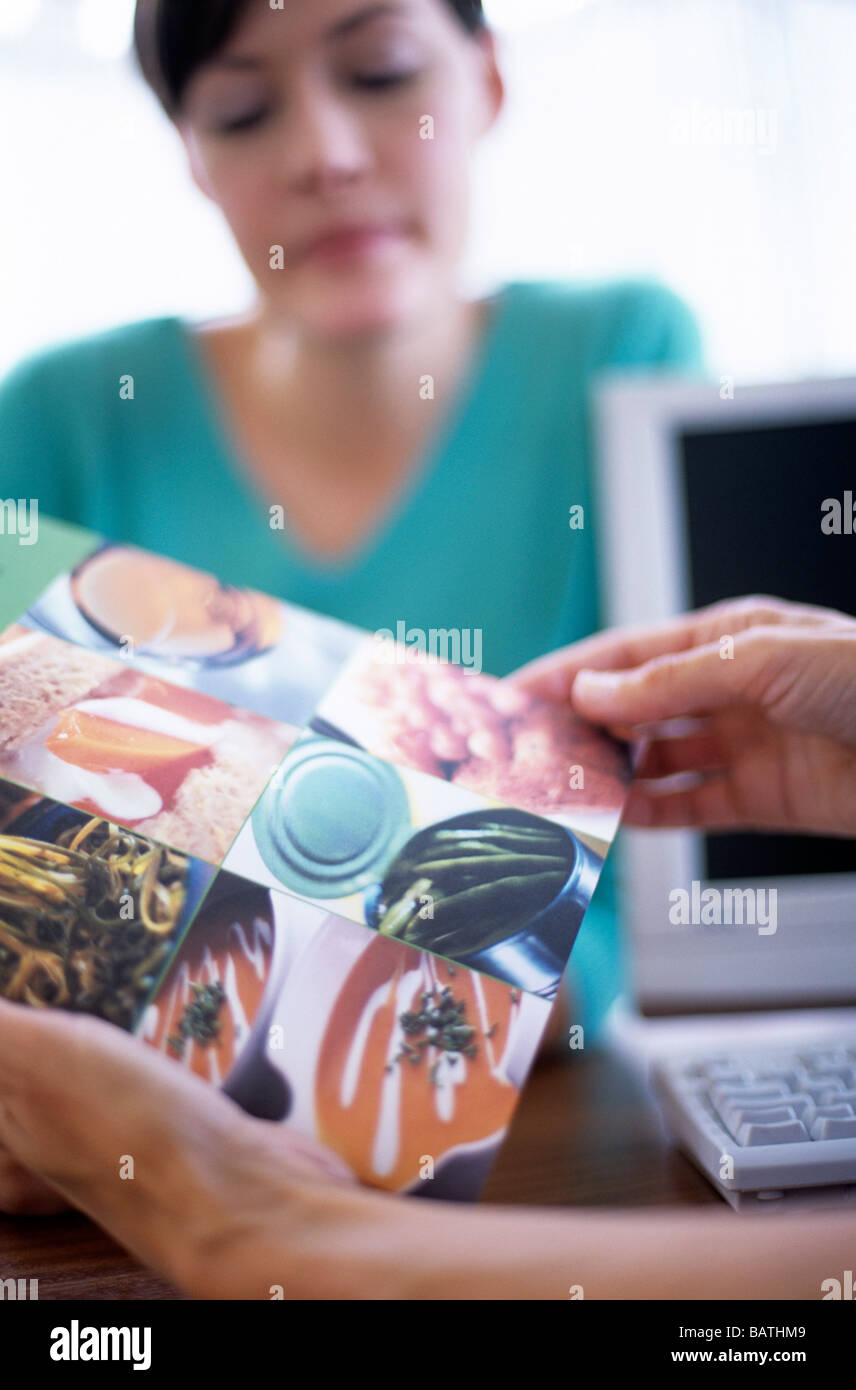 Nutrition advice. Nutritionist advising a 26 years old woman on how to