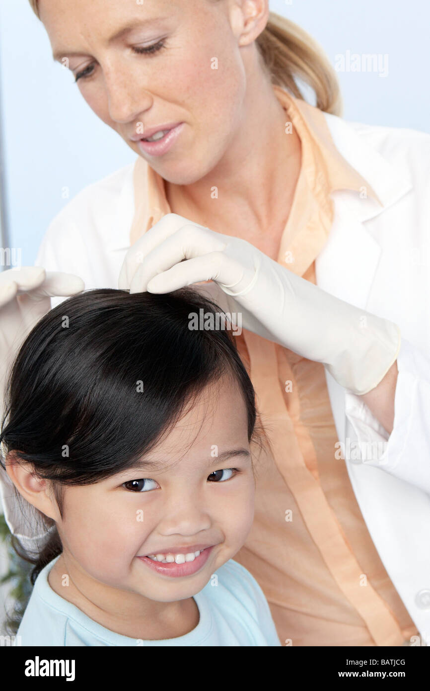 Headlice nurse hires stock photography and images Alamy