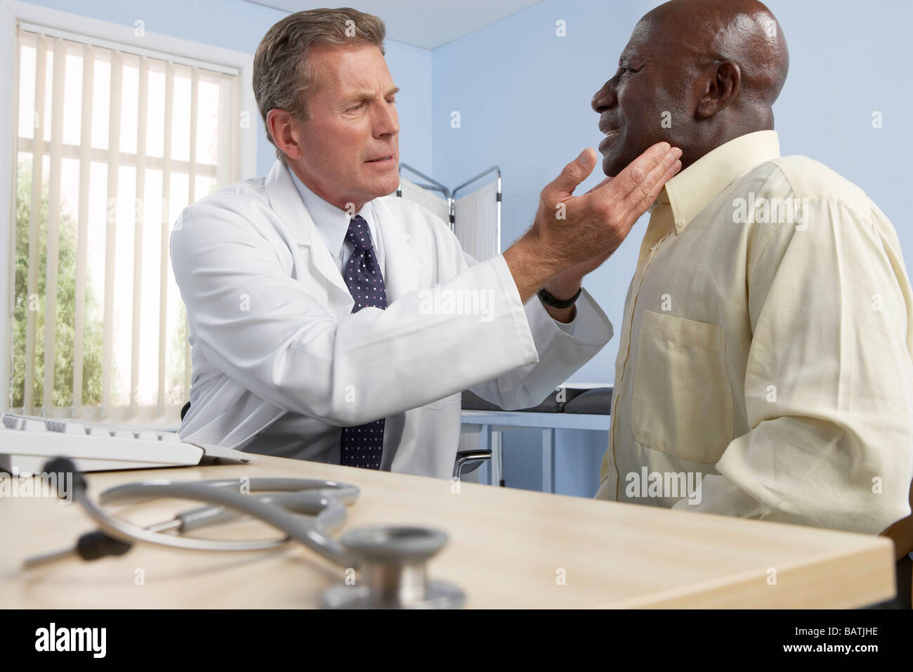 White Doctor Black Patient High Resolution Stock Photography and Images ...