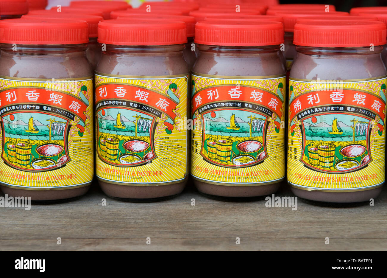 Jars of locally produced shrimp paste at the traditional fishing