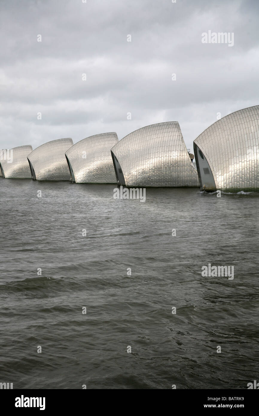 Composite image of Thames Barrier being breached by flood surge Stock Photo