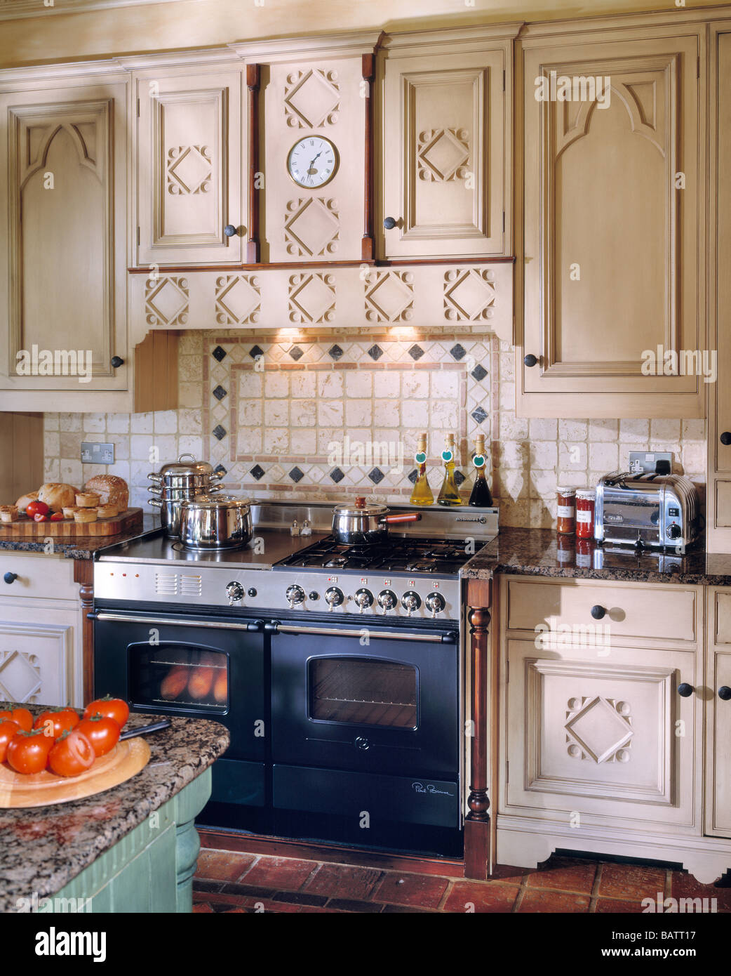 a typical english kitchen with range cooker Stock Photo Alamy