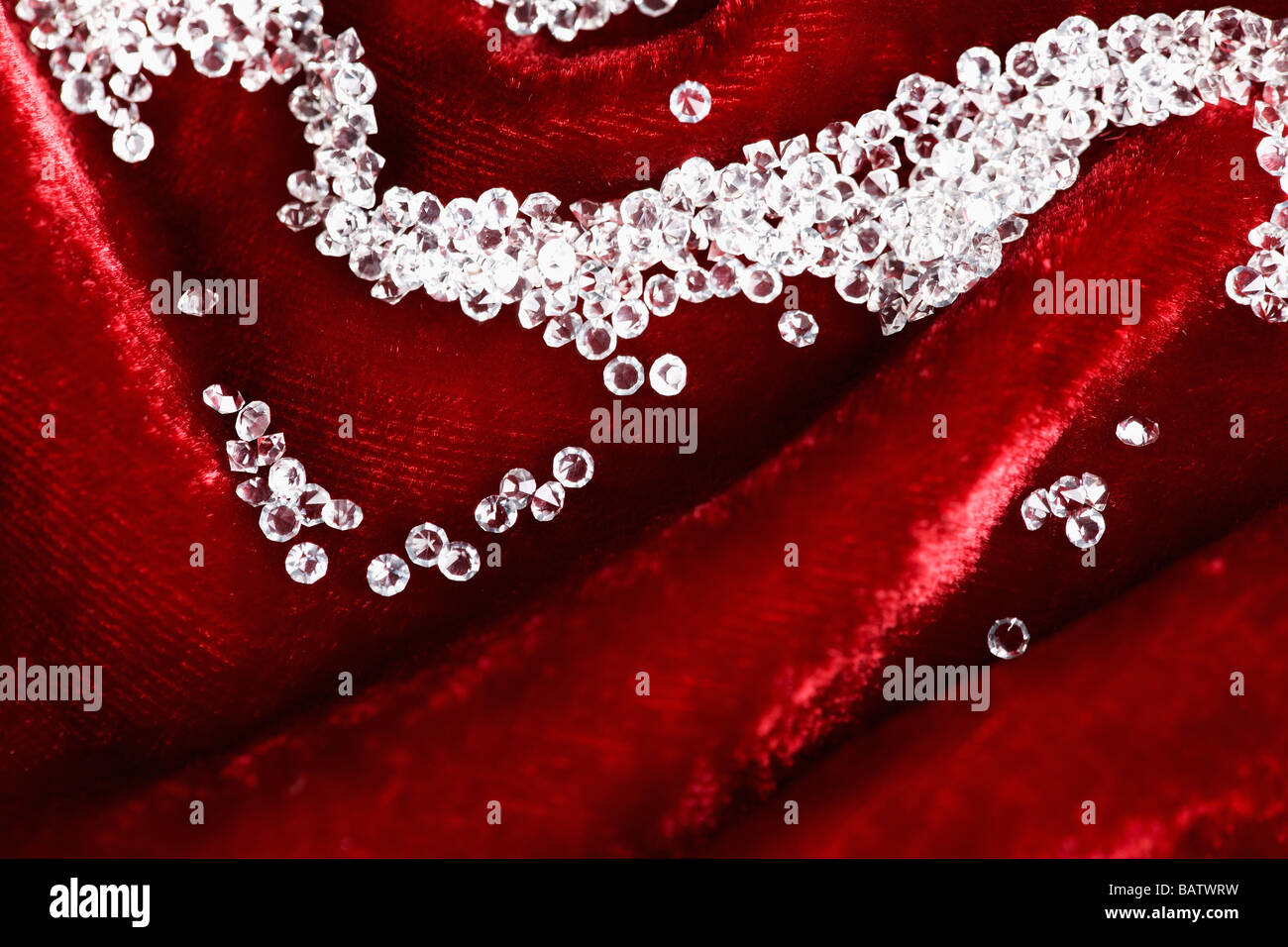 Diamonds on red velvet Stock Photo Alamy