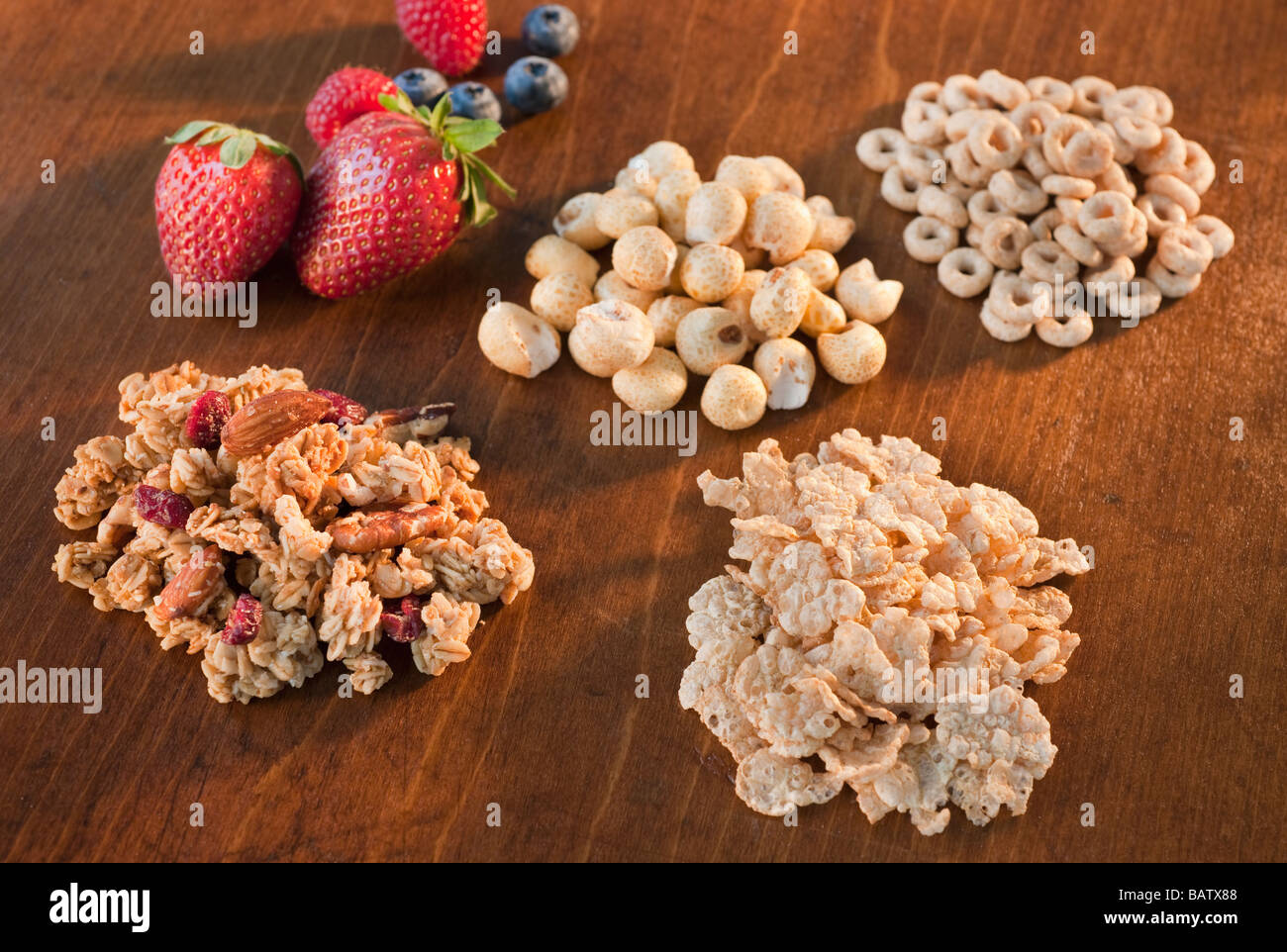 Studio shot of Whole grains, cereal, puffed rice, corn puffs, granola
