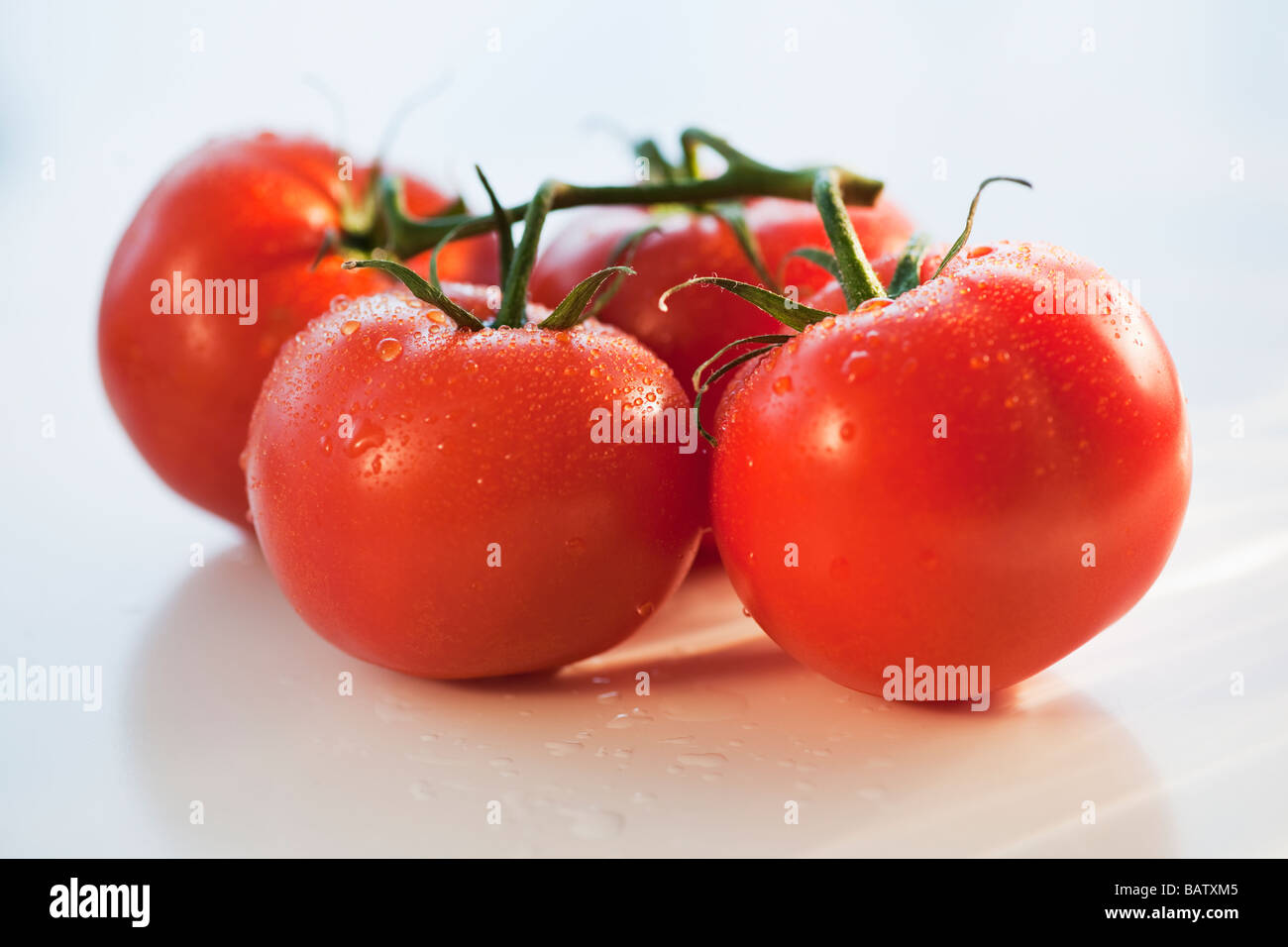 Bunch of tomatoes Stock Photo Alamy