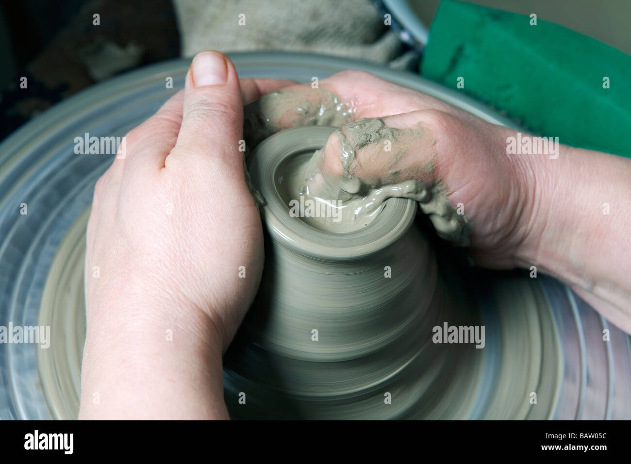detail of potter forming jar on potter´s wheel Stock Photo