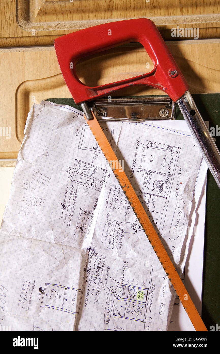 still life of notes and saw Stock Photo - Alamy
