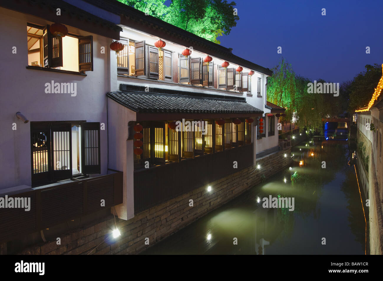 Teahouse On Canal At Dusk, Suzhou, China Stock Photo