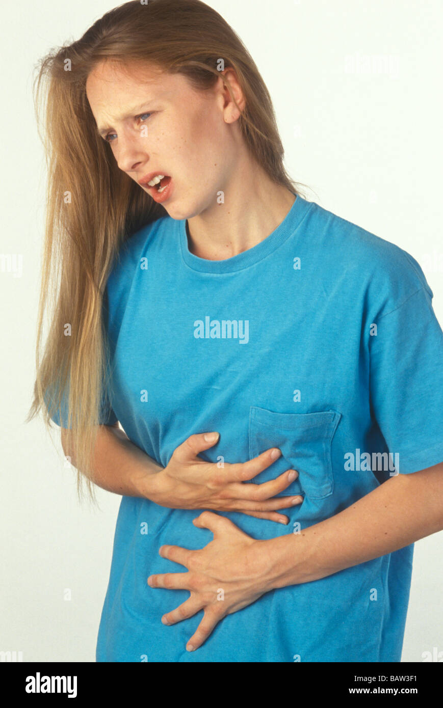 woman with indigestion or tummy ache Stock Photo