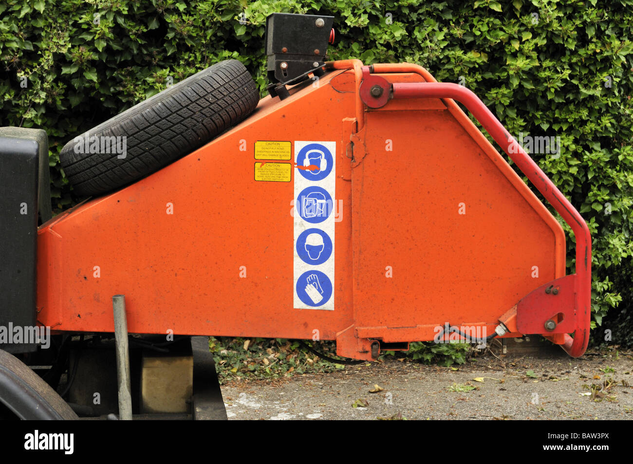 Wooder chipper safety instructions and signs Stock Photo Alamy