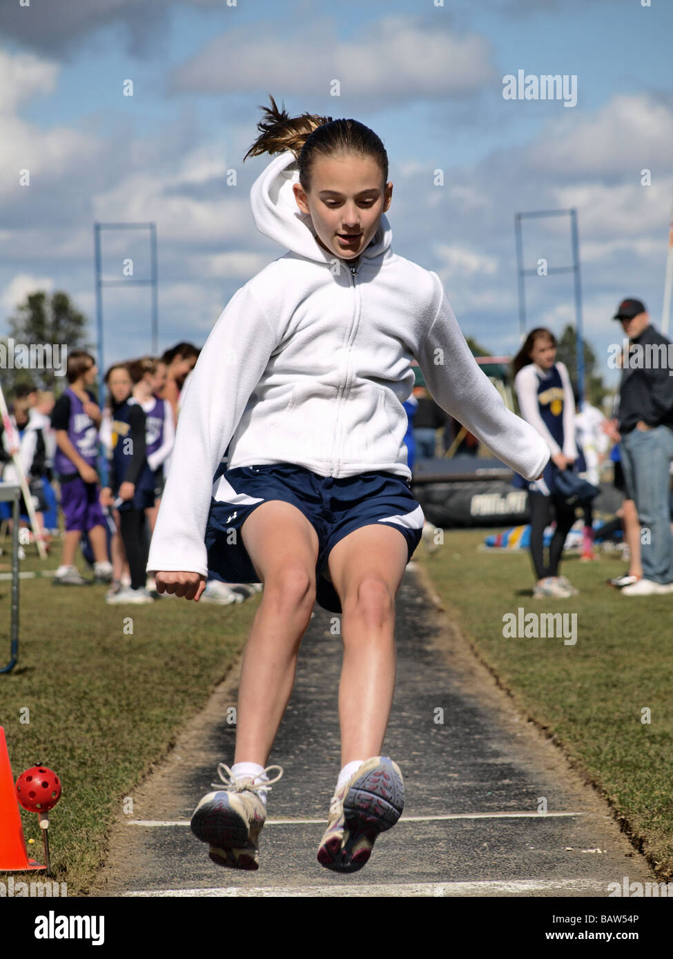 A middle school girl s long jump at a track and field meet in Bend