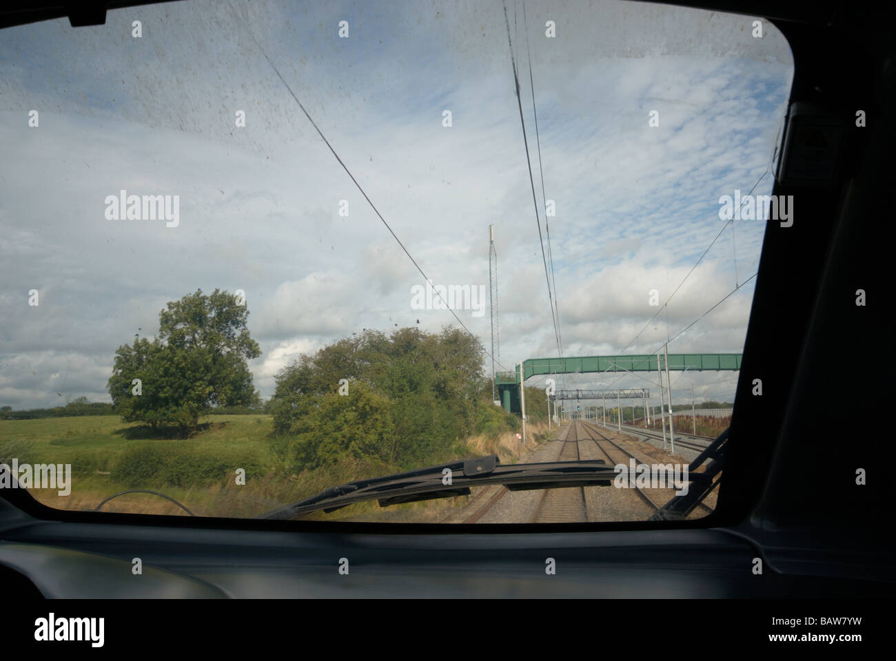 View from the cab on the Virgin Trains London to Manchester 0905 Class 390 Pendolino tilting train Stock Photo