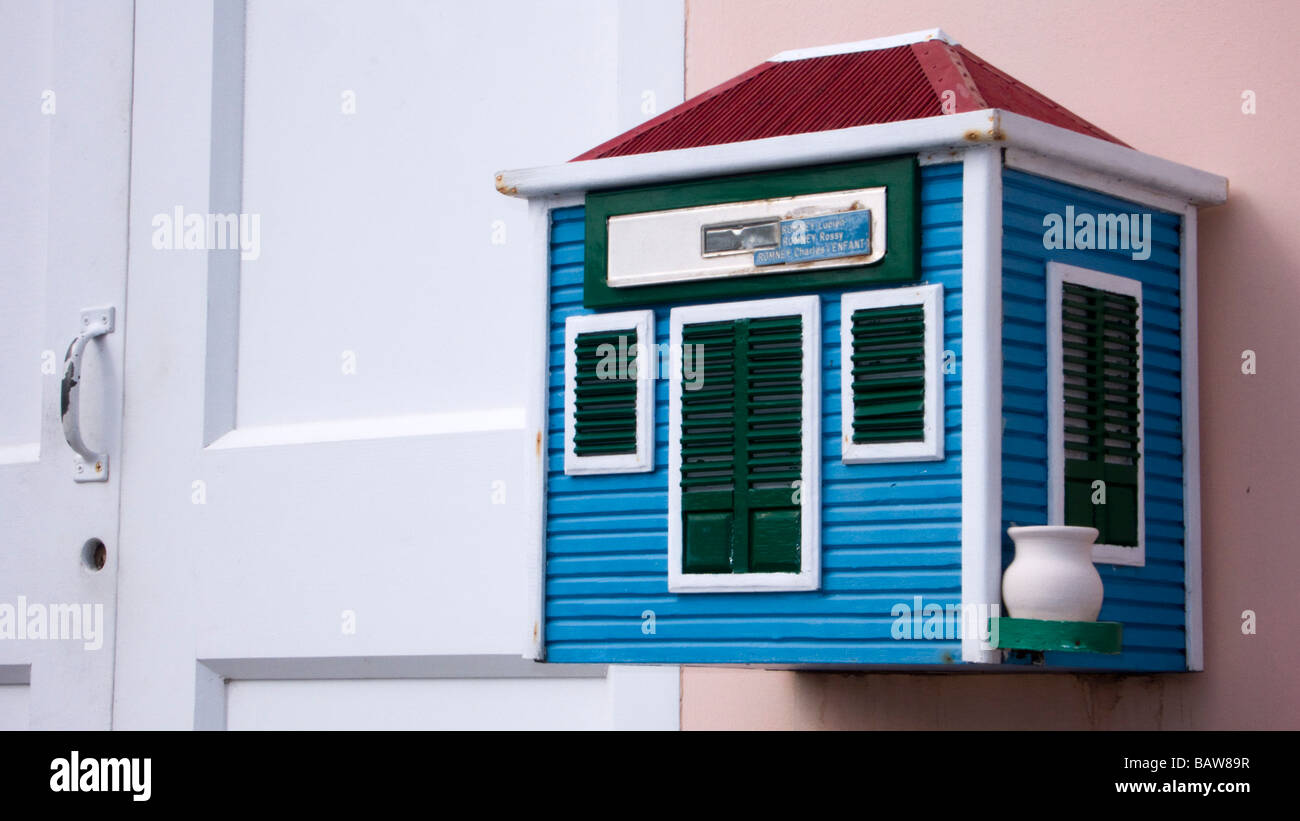 Novelty mailbox shaped like traditional wooden island house St Barts Stock Photo