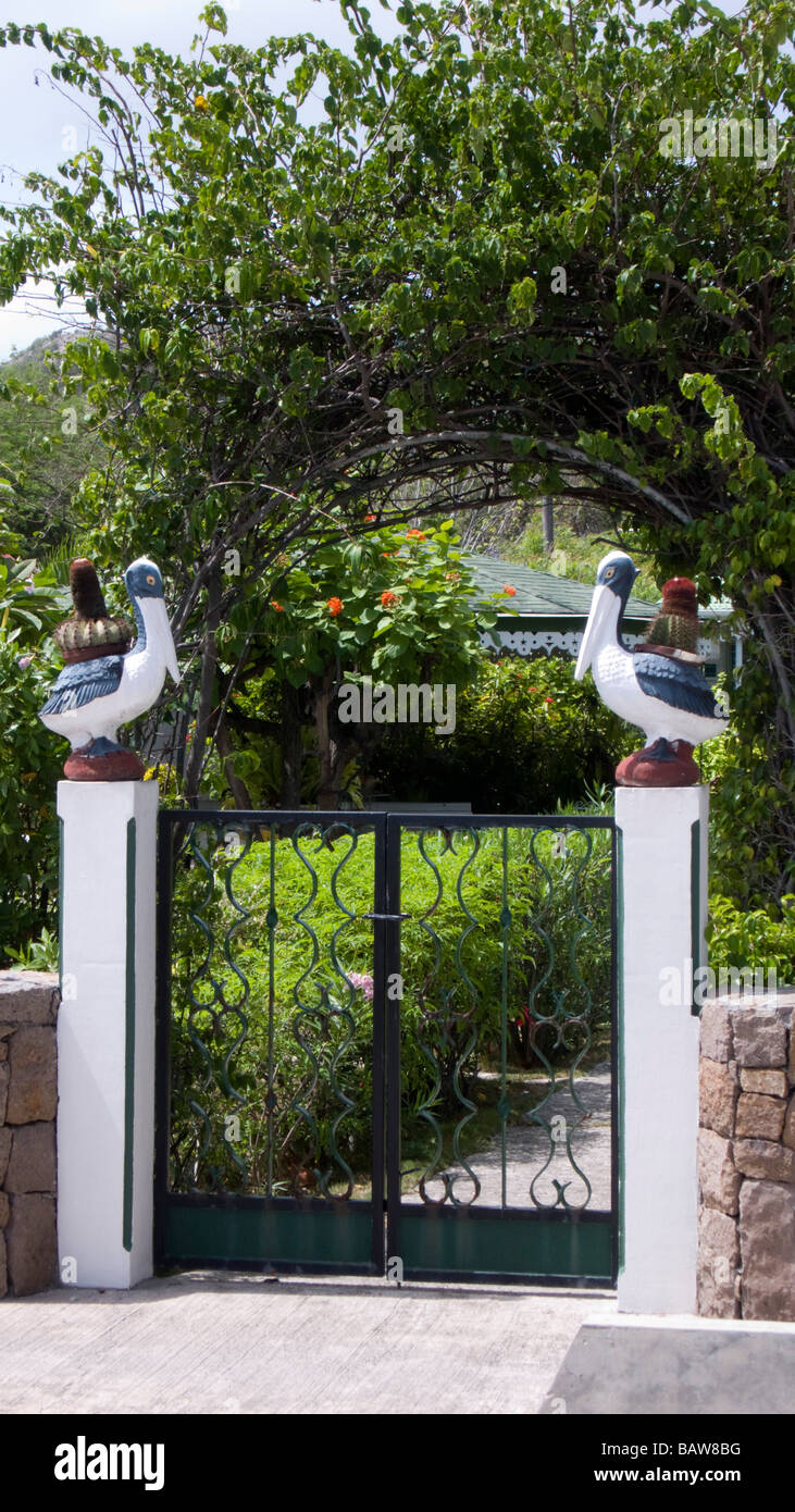 Pelican gate posts St Barts Stock Photo