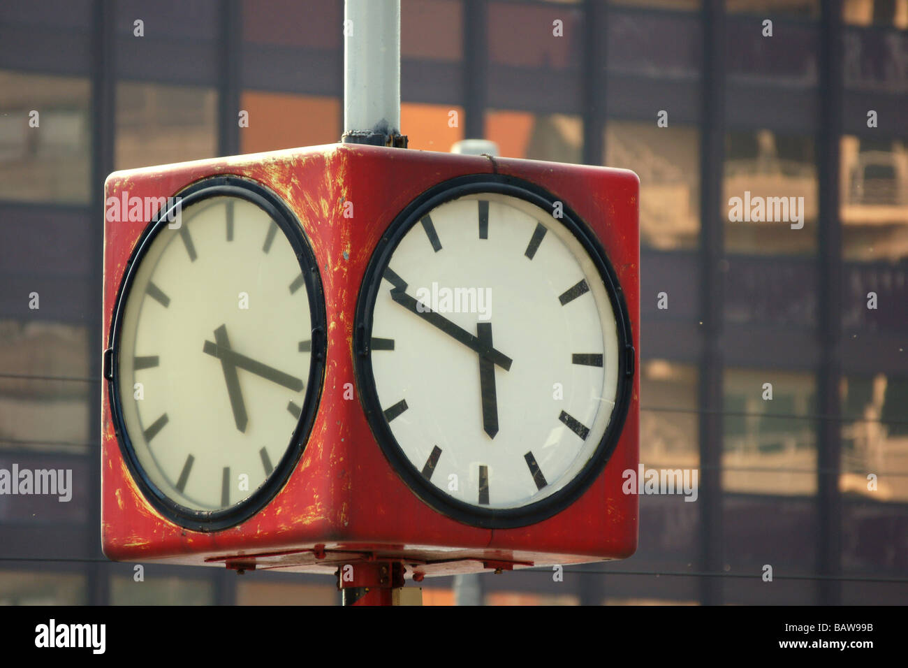 Huge street clock showing different time Rotterdam Netherlands Stock